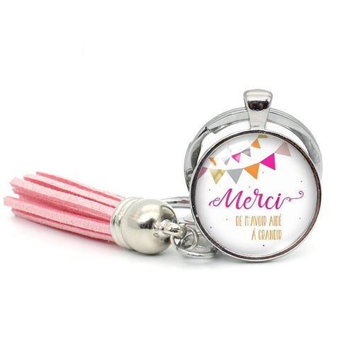 Schlüsselanhänger Familie beim Wachstum helfen